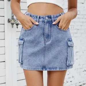 Close-up of vintage blue denim cargo mini skirt with functional side pockets