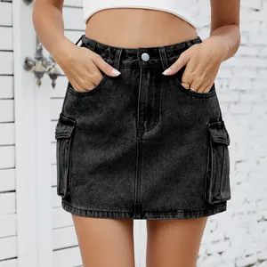 Close-up detail of American retro washed black denim cargo mini skirt with side pockets