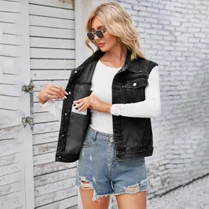 Close-up showing the functional inner pocket detail on a women's washed black denim vest