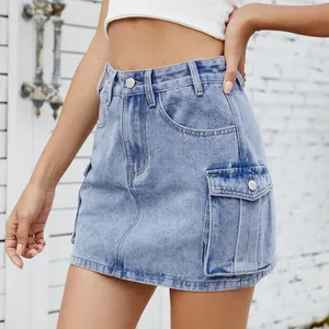 Detailed view of high-waisted denim cargo mini skirt with large pockets