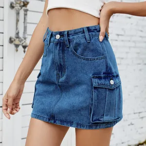 Detailed macro shot of an American retro washed blue denim cargo mini skirt with functional pockets