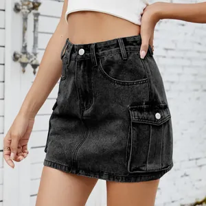 Detailed macro view of American retro washed black denim cargo skirt with large pockets