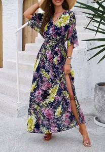 Elegant floral wrap maxi dress with high slit and waist tie for a breezy vacation look