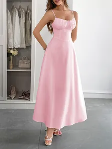 Elegant pink spaghetti strap maxi dress with a waist-slimming fit for summer vacation wear