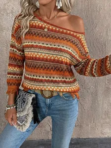 Close-up detail of bohemian vintage striped off-shoulder top featuring fringe trim