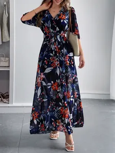 Elegant navy blue floral print wrap maxi dress featuring V-neck and tie-waist for summer vacation