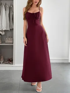 Detail showing the elegant drape and gathered bust of the wine red spaghetti strap dress