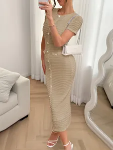 Full view of elegant beige textured midi dress with button details and slim silhouette