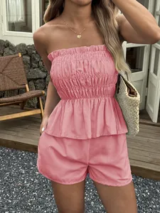 Chic summer striped two-piece set with strapless smocked top and casual shorts