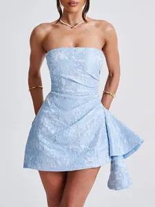 Close-up of the light blue jacquard fabric and strapless design of the French style dress