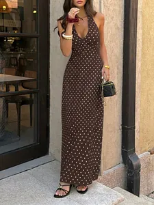 Elegant brown polka dot halter neck maxi dress with deep V-neck for summer vacation style