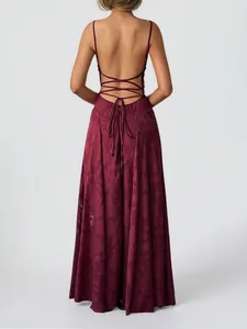 Elegant burgundy maxi dress back view with delicate criss-cross lace-up straps and floral pattern