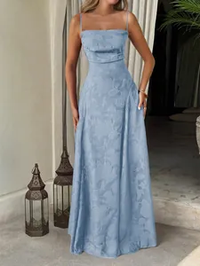 Light blue floral jacquard maxi slip dress with thin straps for elegant resort wear.