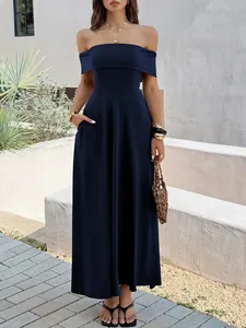 Elegant navy blue off-shoulder evening maxi dress with side pockets and waist-cinching fit