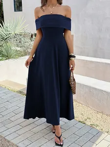 Elegant navy blue off-the-shoulder maxi dress perfect for a French summer evening look