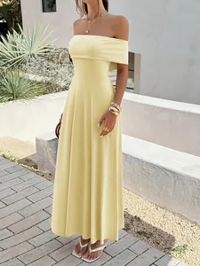 Elegant yellow off-the-shoulder maxi dress for formal summer party and beach wedding.