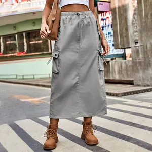 Gray denim cargo midi skirt with drawstring and side pockets in urban street style