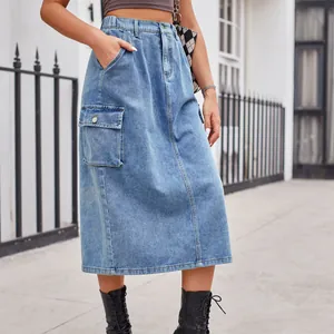Detailed view of stylish light blue washed denim midi skirt with side cargo pocket design
