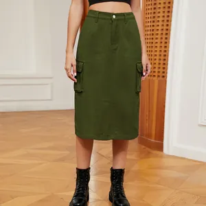 Premium olive green cargo midi skirt in washed denim featuring functional side pockets