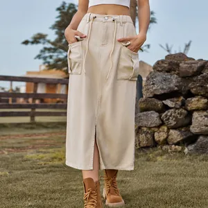 Close-up of beige khaki denim cargo skirt with drawstring waist and front slit
