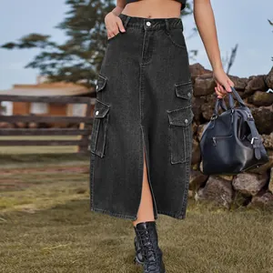 Close-up of black denim cargo skirt with large utility pockets and stylish front slit design