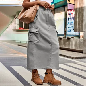 Stylish grey cargo maxi skirt with drawstring waist and side pockets in urban setting