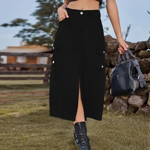 Detail view of black high-waisted cargo midi skirt with flap pockets and front slit