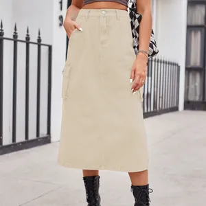 Khaki cargo denim midi skirt with side pockets in a stylish urban street setting