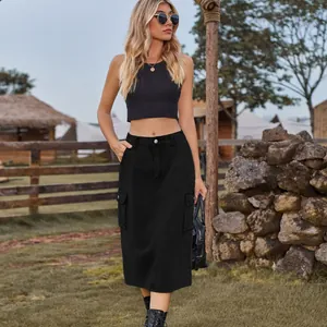 Stylish lifestyle view of a woman wearing a black cargo denim midi skirt outdoors