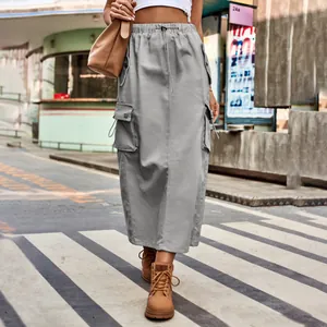 Grey denim cargo maxi skirt with drawstring waist and pockets on model