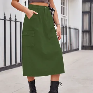 Stylish outdoor close-up of olive green cargo washed denim midi skirt for women