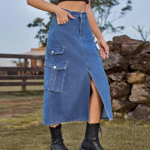 Close-up detail of blue denim cargo midi skirt featuring a front slit and side pockets