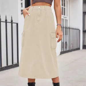 Elegant beige cargo style washed denim midi skirt featuring large side pockets and high waist