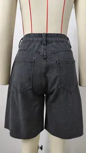 Detailed back view of premium washed dark grey denim shorts with raw edge finish