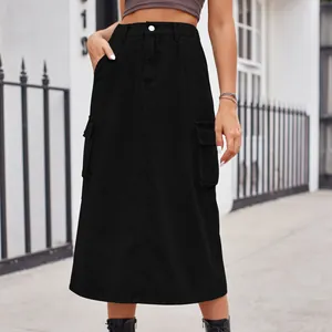 Stylish black washed denim cargo midi skirt with side flap pockets for women