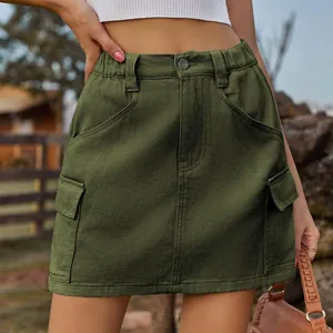 Detailed view of dark green cargo mini skirt with elastic waist and side pockets