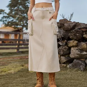 Detail view of a khaki denim cargo skirt with side pockets and drawstring accents.