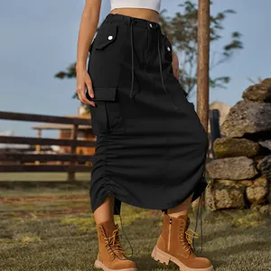 Detailed shot of black denim cargo skirt with drawstring hem and utility pockets