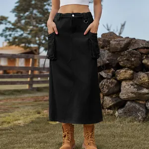 Detailed view of a black vintage cargo denim midi skirt featuring large utility pockets