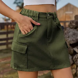 Detailed macro view of army green washed cargo mini skirt with elastic waist and pockets
