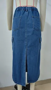 Detailed back view of a washed blue denim cargo skirt featuring pockets and a rear slit