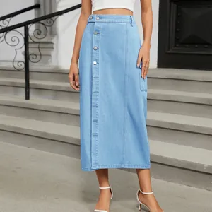 Close-up view of a light blue denim cargo maxi skirt with elegant button front design