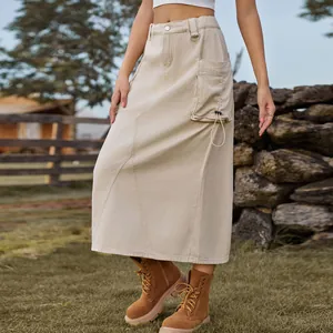 Close-up of khaki cargo midi denim skirt with side pockets and utility details