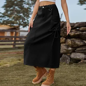 Detail view of a vintage black denim cargo midi skirt with side pocket and drawstring.