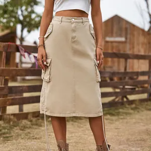 Front view of khaki cargo denim midi skirt with drawstring details and large side pockets.