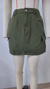 Front view of army green cargo mini skirt with elastic waist and pockets on a mannequin
