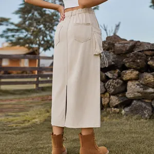 Back view of a retro beige denim cargo midi skirt with a high waist and slit detail