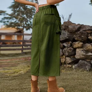 Back view of vintage olive green cargo denim midi skirt with pockets and back slit