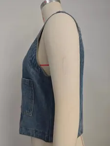 Detailed side view of a cropped blue washed denim vest for women on a mannequin