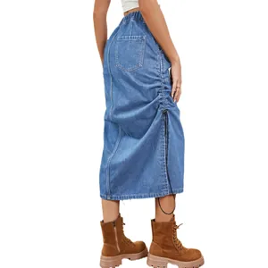 Stylish washed blue denim midi skirt featuring an elastic waist and side drawstring detail